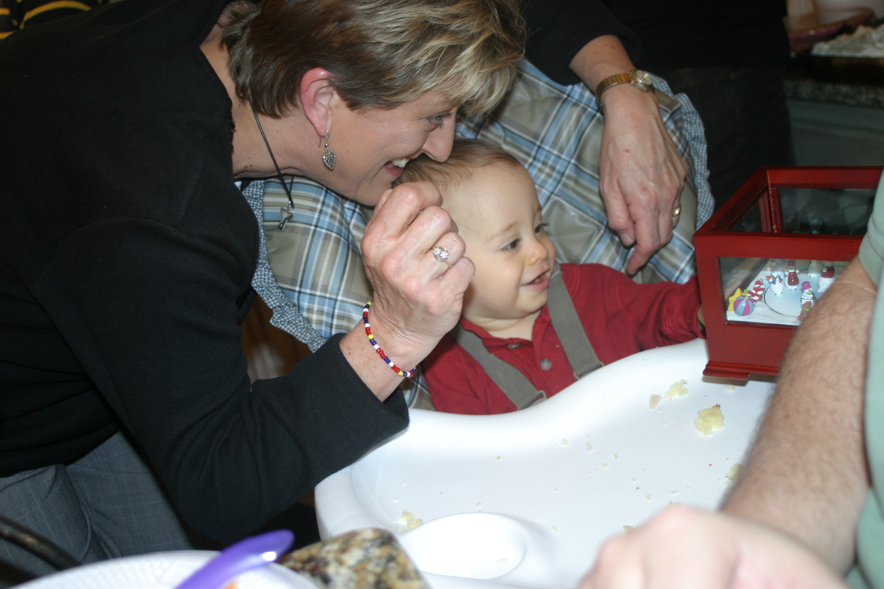 Laughing at his new music box from Pat & Pete