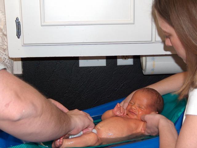 Tyler's not so sure about this whole bath thing...