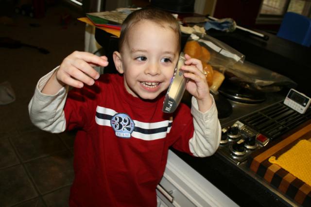 Very excitedly telling Daddy about the cupcakes