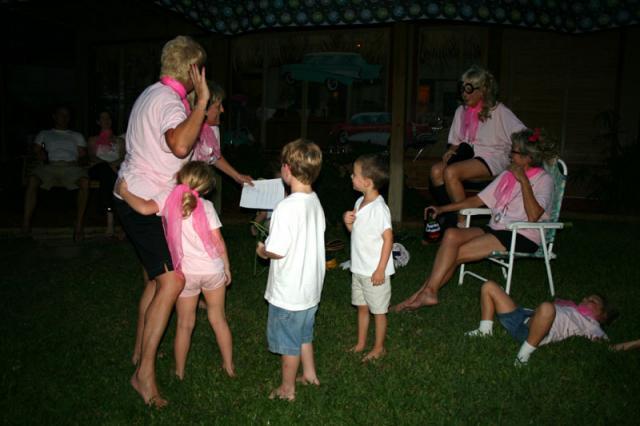 The petites sing the "12 Days of 60" to the birthday girls